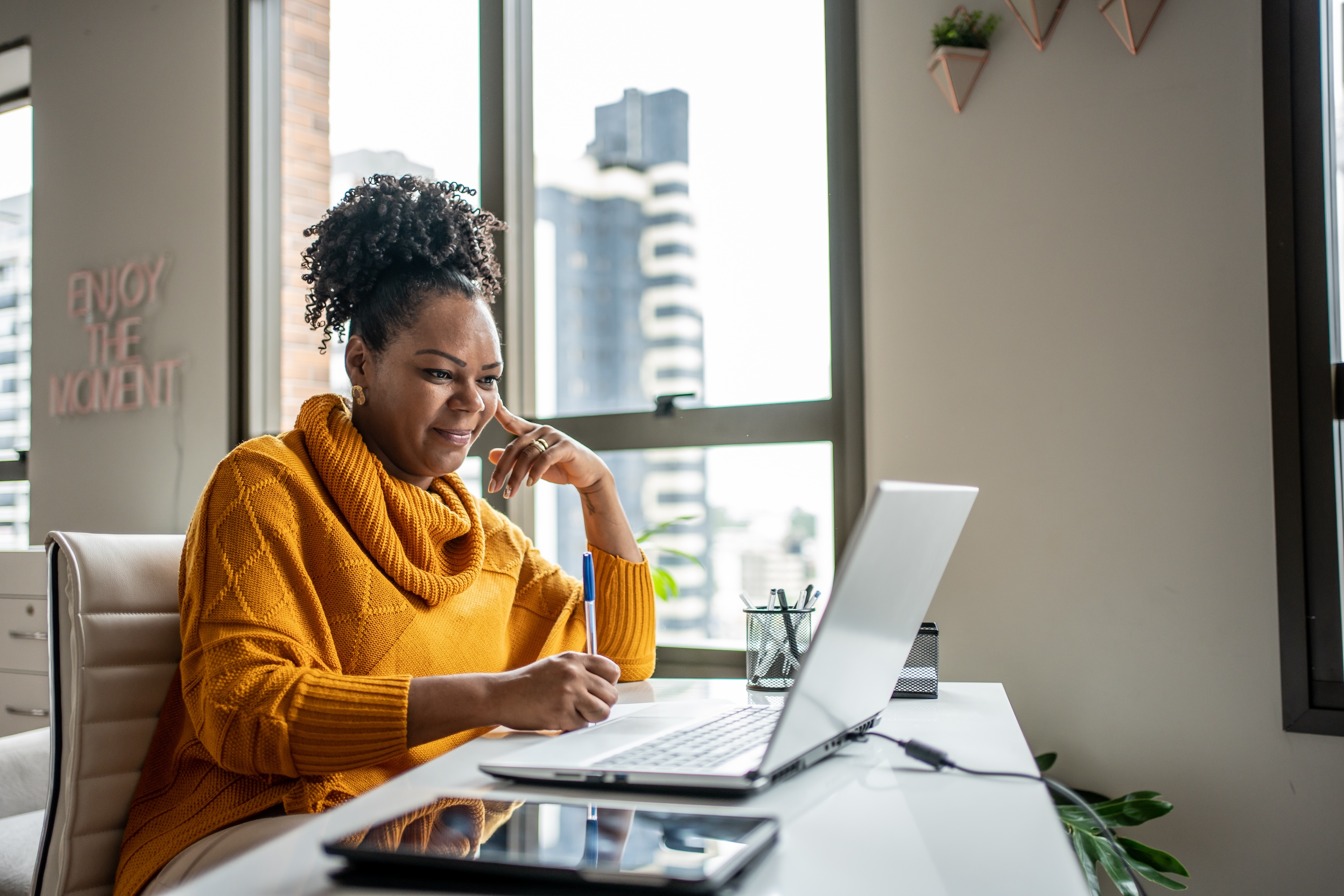 black woman working from home office