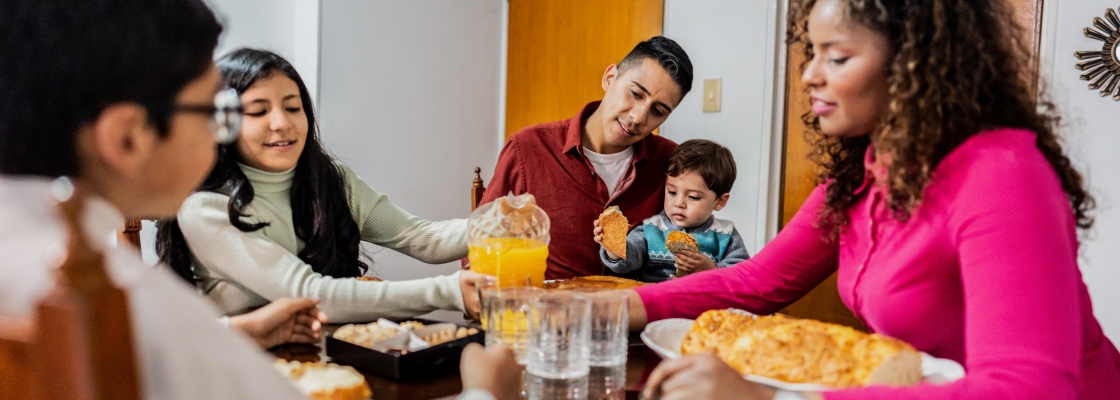 family having breakfast together at home