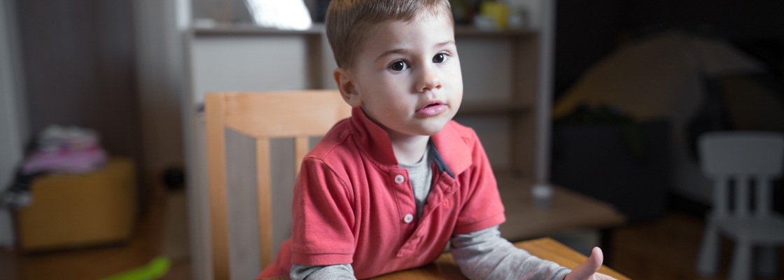 little boy waiting for his dinner