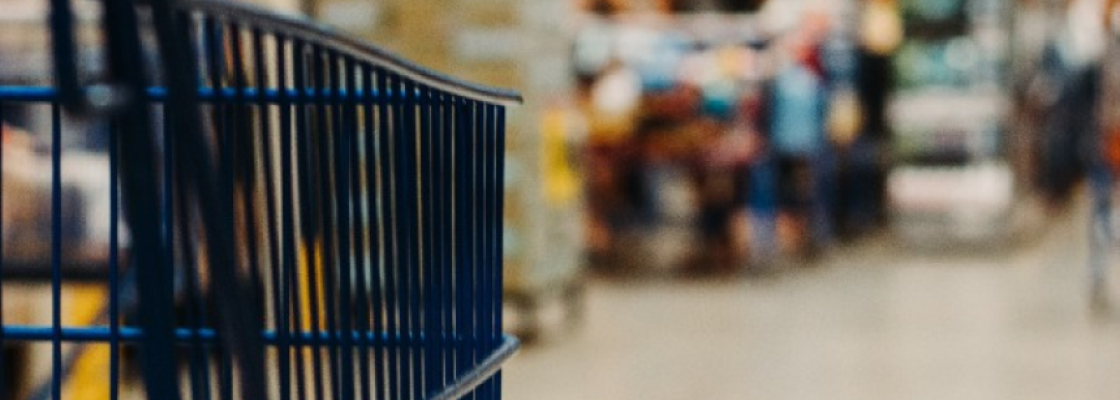 side of a shopping cart in a grocery store